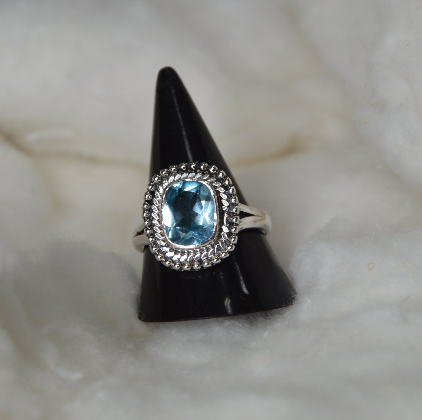 Blue Topaz Ring in 925 Sterling Silver with antique black oxidized polish for a timeless vintage look.
Handcrafted blue topaz gemstone ring in sterling silver, made by Jaipur artisans.
A bold unisex silver ring featuring natural blue topaz and oxidized polish finish.
Cushion-cut real blue topaz set in handcrafted oxidized silver — perfect for spiritual wear.
Shop authentic 925 silver rings with genuine blue topaz from Jaipur jewelry manufacturers.
Luxury meets bohemian style with this black-polished sterlin