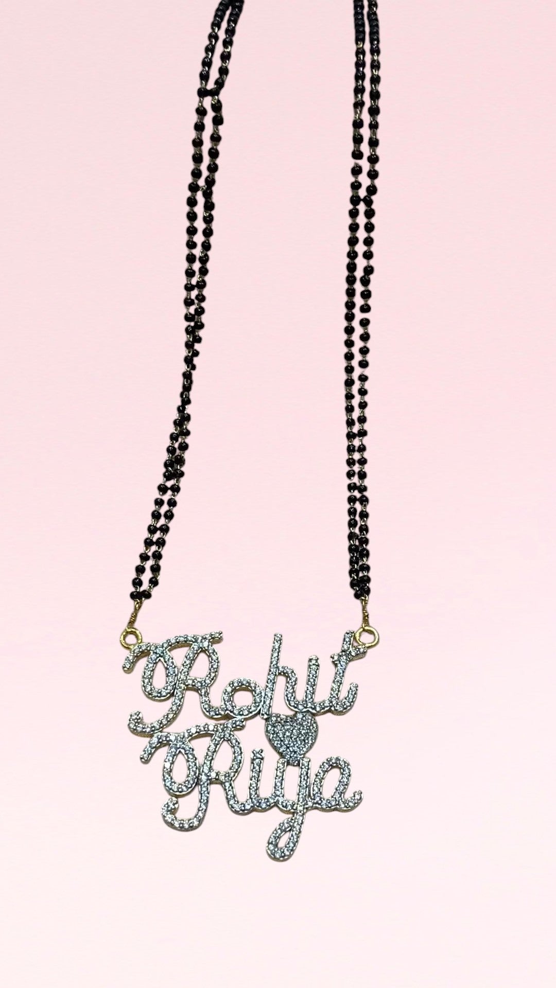 In Hindu tradition, the Mangal Sutra is a sacred thread signifying marital vows and eternal connection. This customized version brings a fresh, modern narrative to that age-old sentiment, making it deeply relevant for today’s bride who values meaning and fashion equally. Whether you’re a minimalist who prefers subtle elegance or someone who adores statement pieces, this personalized name mangalsutra is designed to match every mood and moment. It aligns perfectly with contemporary trends yet retains the cult