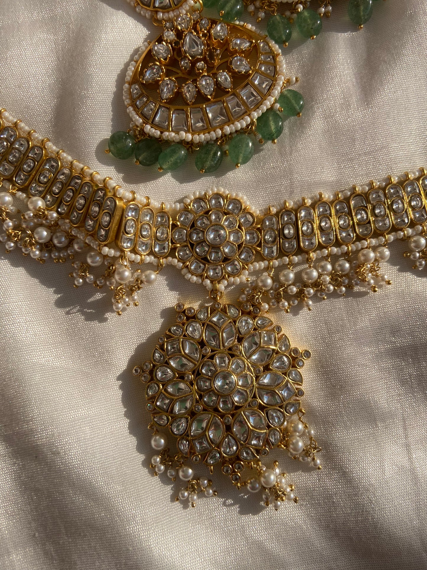 Our commitment to traditional craftsmanship ensures that every necklace is handmade with devotion and precision. As this is a fully handcrafted piece using Kundan Meena art, it takes 15 days to make. Please allow this time for us to deliver perfection. The necklace comes in premium packaging that reflects the value of the jewelry within and makes it ideal for gifting during weddings, engagements, anniversaries, or religious functions. The thoughtful presentation makes it not just a product but a complete