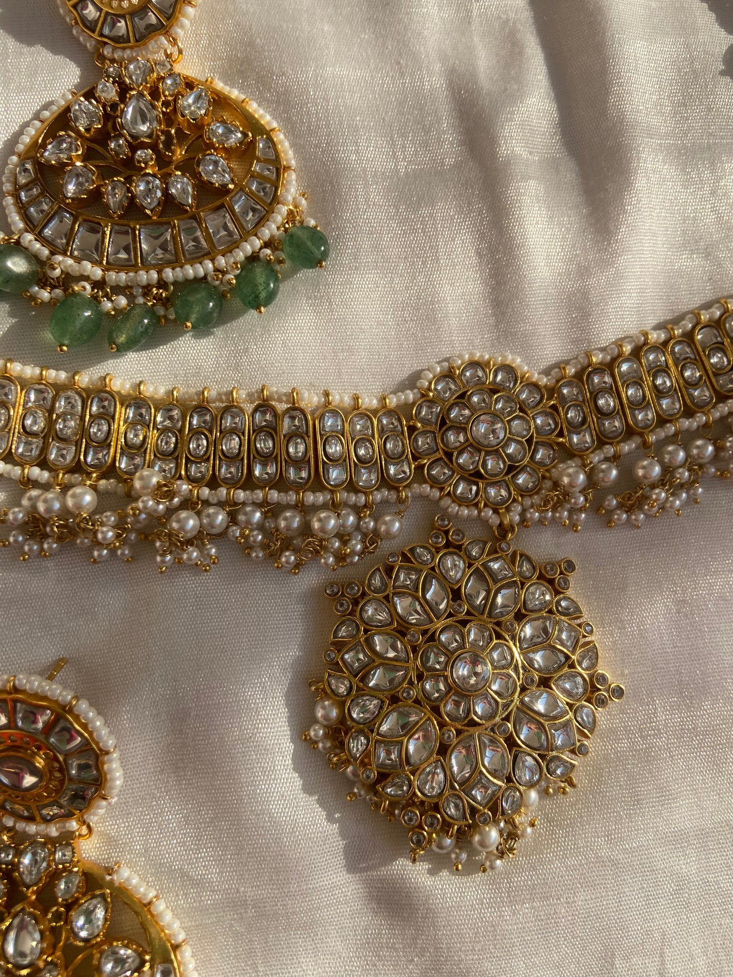 It is sustainable fashion at its finest, balancing ethical choices with spiritual and aesthetic beauty.
Each piece is made with love, patience, and traditional expertise in Jaipur—the heart of India's royal jewelry craftsmanship. This necklace takes 15 days to complete, a testament to the level of care and detail involved. The emerald and pearl bead knitting is done by hand, a delicate process that ensures uniqueness and individuality in every necklace.