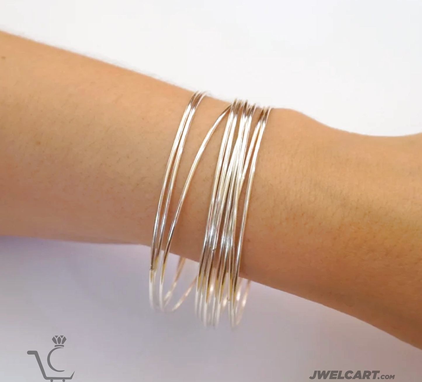 women wearing silver bangle