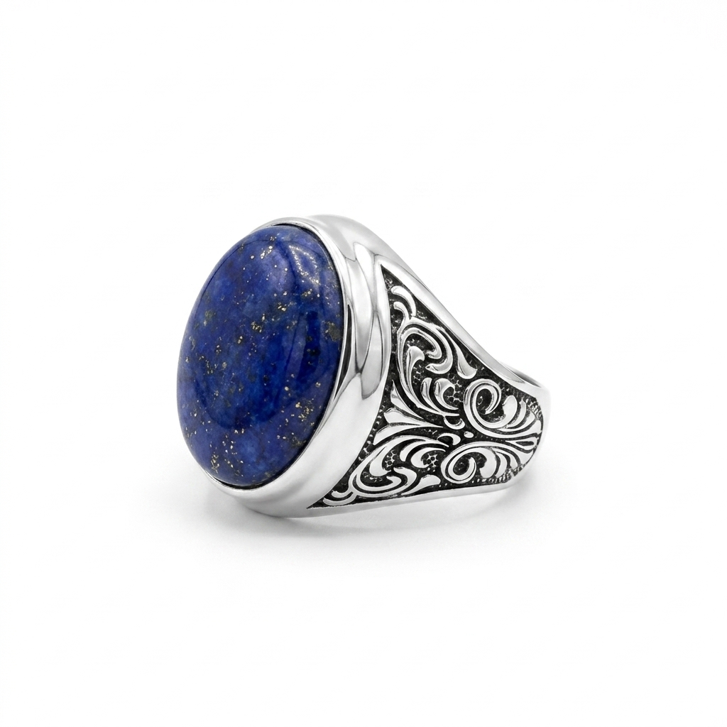 Every detail reflects the precision of experienced jewelers who understand the value of fine handmade jewelry.

The centerpiece of this ring is a genuine Natural Lapis Lazuli gemstone, admired for its rich royal blue color and naturally occurring golden pyrite inclusions. Since ancient civilizations, Lapis Lazuli has symbolized wisdom, confidence, truth, leadership, and inner strength. Today, it remains one of the most desirable natural gemstones for luxury men's jewelry and artisan silver rings.