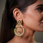 Moissanite Polki Earrings in 925 Sterling Silver with luxurious 22K gold plating, handcrafted bridal Chandbali earrings with green emerald stones, designer Indian wedding earrings inspired by royal Mughal and Rajasthani jewelry traditions. Premium handmade ethnic earrings featuring sparkling Moissanite Polki diamonds, statement bridal jewelry for lehenga, saree, Anarkali and festive outfits. Luxury bridal Chandbali earrings with antique finish, perfect for brides, bridesmaids, wedding guests, reception, 