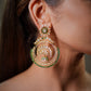 Statement ethnic earrings with fine Polki detailing, handcrafted gemstone setting and antique gold aesthetics. Luxury Indian bridal earrings suitable for wedding trousseau collections, festive wear and designer ethnic fashion styling.

Royal Indian wedding earrings handcrafted with Moissanite Polki stones and emerald gemstones, luxury bridal jewelry for women who love traditional handcrafted artistry. Designer bridal Chandbali earrings inspired by Mughal and Bollywood fashion trends, featuring detailed arti