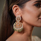 These handcrafted Polki Earrings Set with Green Emerald and Pearl in 925 Sterling Silver with luxurious 22K Gold Plating represent the timeless beauty of traditional Indian jewelry crafted with modern elegance. Inspired by royal Jaipur India jewelry artistry, these premium bridal earrings combine sparkling Polki stones, rich green emerald gemstones and delicate pearl