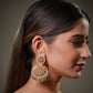 Gold plated silver jewelry is becoming increasingly popular among brides because it offers premium luxury aesthetics while maintaining affordability compared to solid gold jewelry. Women today prefer investment worthy bridal jewelry that can be styled repeatedly with different ethnic outfits, and sterling silver Polki earrings perfectly fit this demand.

Handcrafted emerald pearl earrings are also highly searched for destination weddings, festive events and luxury ethnic styling because they look elegant bo