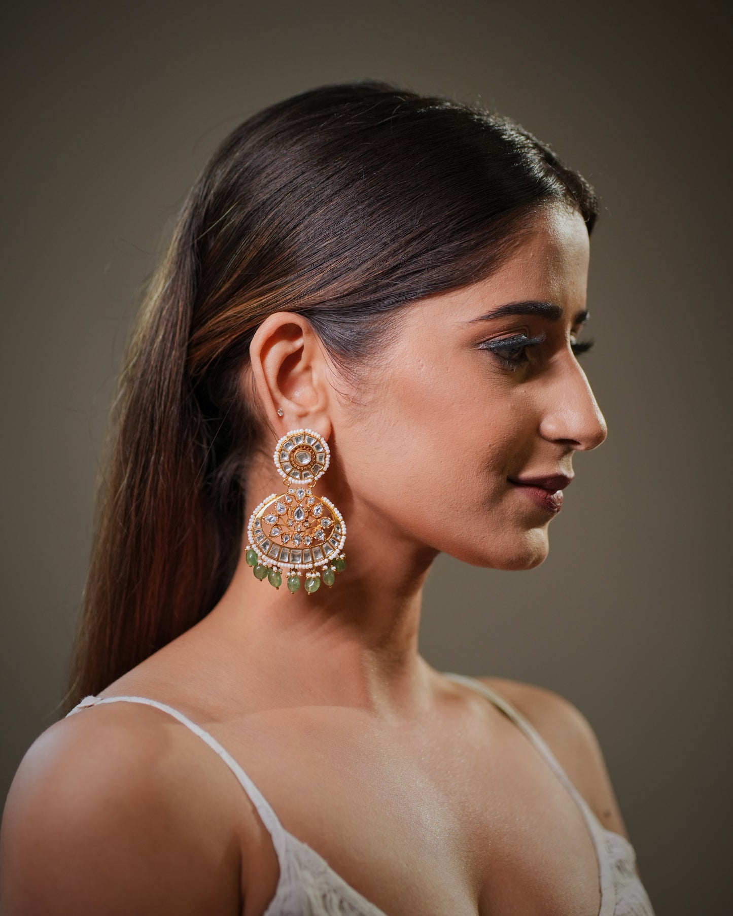 detailing to create a statement luxury look perfect for weddings, festive occasions and bridal couture fashion. Jaipur has always been known as the heart of handcrafted gemstone jewelry manufacturing in India, and these designer Chandbali earrings reflect the authentic heritage craftsmanship that skilled artisans from Jaipur are famous for worldwide.