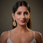 Made in 925 stamped sterling silver, these bridal earrings are not only a fashion statement but also a smart investment in precious metal jewelry. Sterling silver jewelry from India continues to gain popularity because of its long term value, durability and luxury appeal. Unlike artificial fashion jewelry, silver jewelry retains value over time and offers a premium feel with lasting quality. Investing in handcrafted silver bridal jewelry gives customers a combination of beauty,