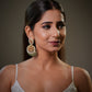 craftsmanship and metal worth, making it one of the most searched jewelry categories online. Gold plated sterling silver earrings provide the rich appearance of fine gold jewelry while remaining more affordable and wearable for modern women who love luxury ethnic fashion.

These emerald Polki earrings are ideal for Indian brides looking for royal wedding jewelry inspired by Mughal, Rajasthani and heritage Indian jewelry traditions.