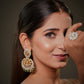 Brides searching for statement earrings for wedding, reception, sangeet, mehendi or engagement functions often choose handcrafted Polki Chandbali earrings because of their luxurious appearance and timeless appeal.

The use of pearls in these bridal earrings adds softness, grace and traditional elegance. Pearl earrings are highly searched for bridal styling because they symbolize sophistication, femininity and heritage luxury.