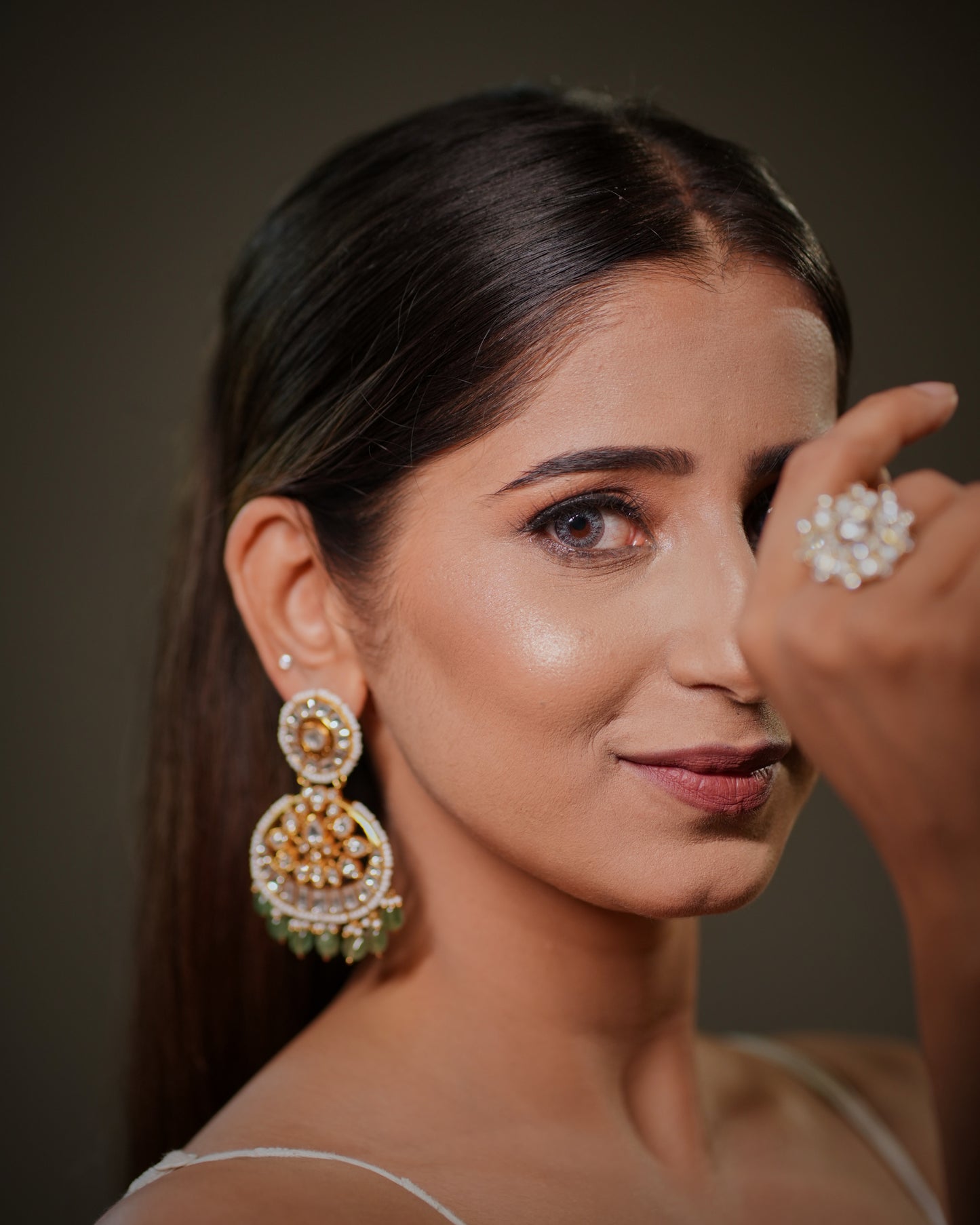 elegant bridal ring, trendy cocktail ring, wedding guest jewellery, silver statement ring, luxury festive accessories, bridal ring collection, royal maharani jewellery, indian artisan jewellery, handcrafted bridal accessories, traditional glamour jewellery, premium polki jewellery, stylish adjustable ring, floral gemstone jewellery, indian festive fashion, bridal elegance jewellery, silver luxury ring, designer wedding accessories, wedding season jewellery.