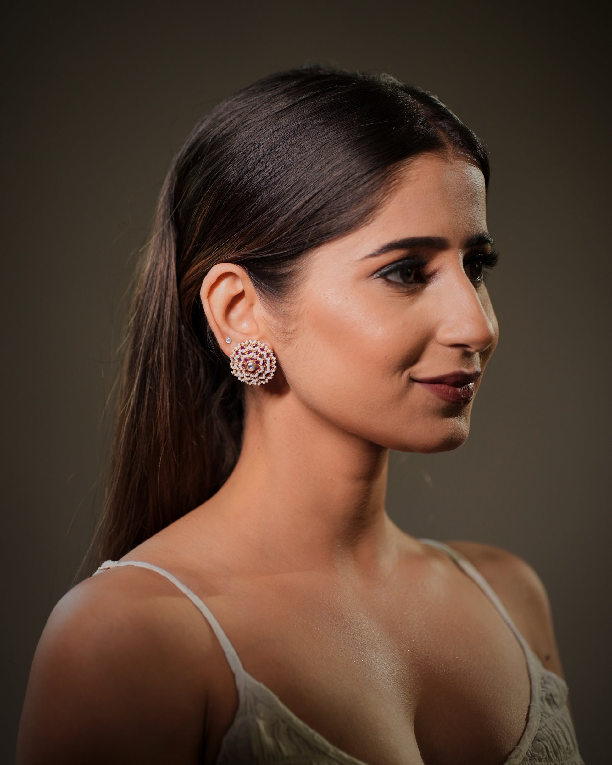 Each pair is meticulously handcrafted by skilled artisans from Jaipur, India's world-renowned gemstone and jewelry manufacturing hub, where generations of master craftsmen have preserved the art of fine jewelry making. Every detail, from gemstone selection and precise stone setting to polishing and finishing, reflects exceptional craftsmanship and uncompromising quality. Our artisans use traditional techniques combined with modern precision to create jewelry that is both beautiful and durable.
