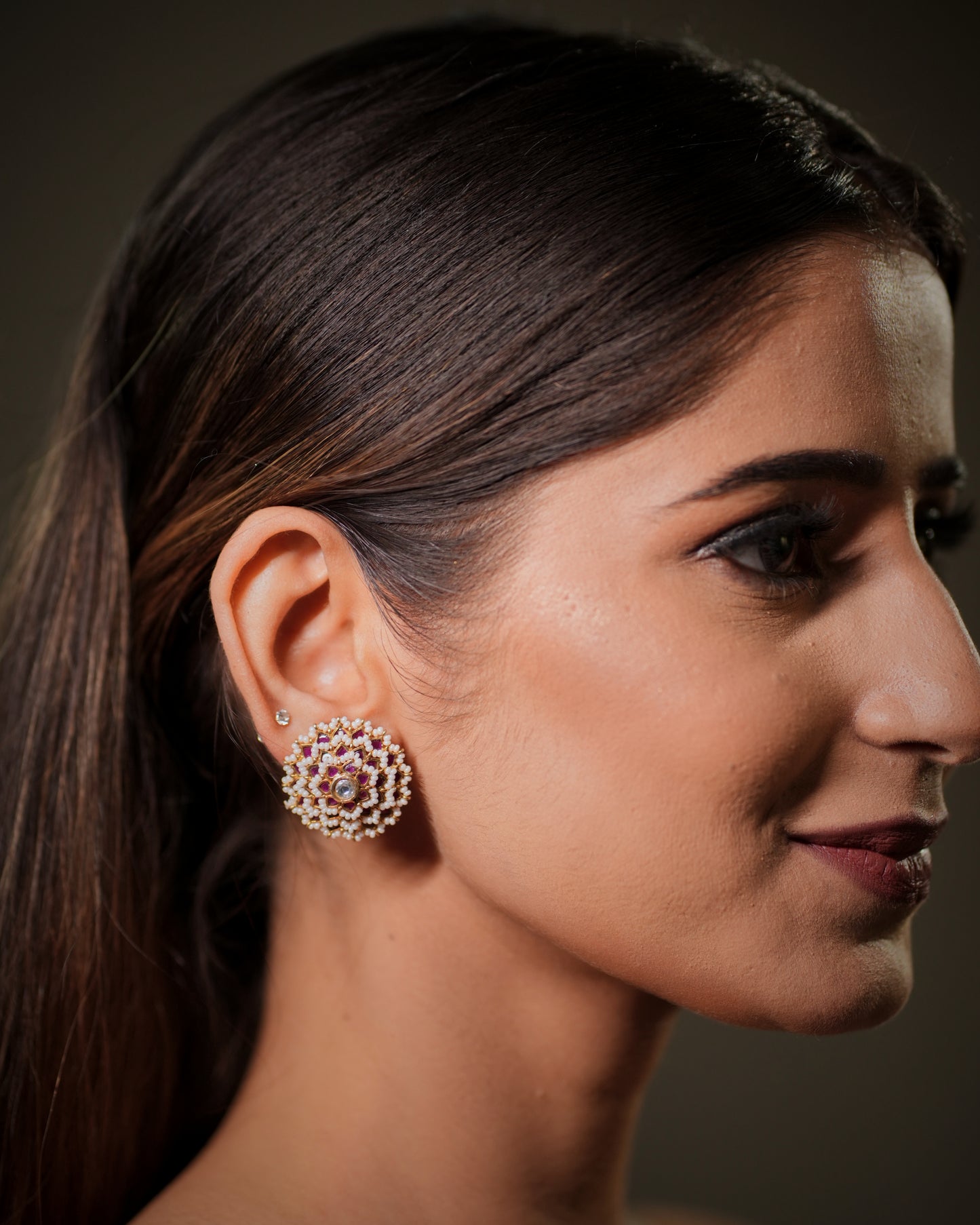 Crafted from genuine 925 Sterling Silver and hallmarked for authenticity, these earrings are designed to offer lasting beauty and superior quality. The premium 22K Gold Plated finish adds a radiant golden shine while protecting the silver beneath, giving the earrings a luxurious appearance suitable for everyday elegance as well as grand celebrations. Every piece undergoes careful quality inspection to ensure outstanding finish, comfort, and durability.
The combination of sparkling Polki, rich Pink Ruby, 