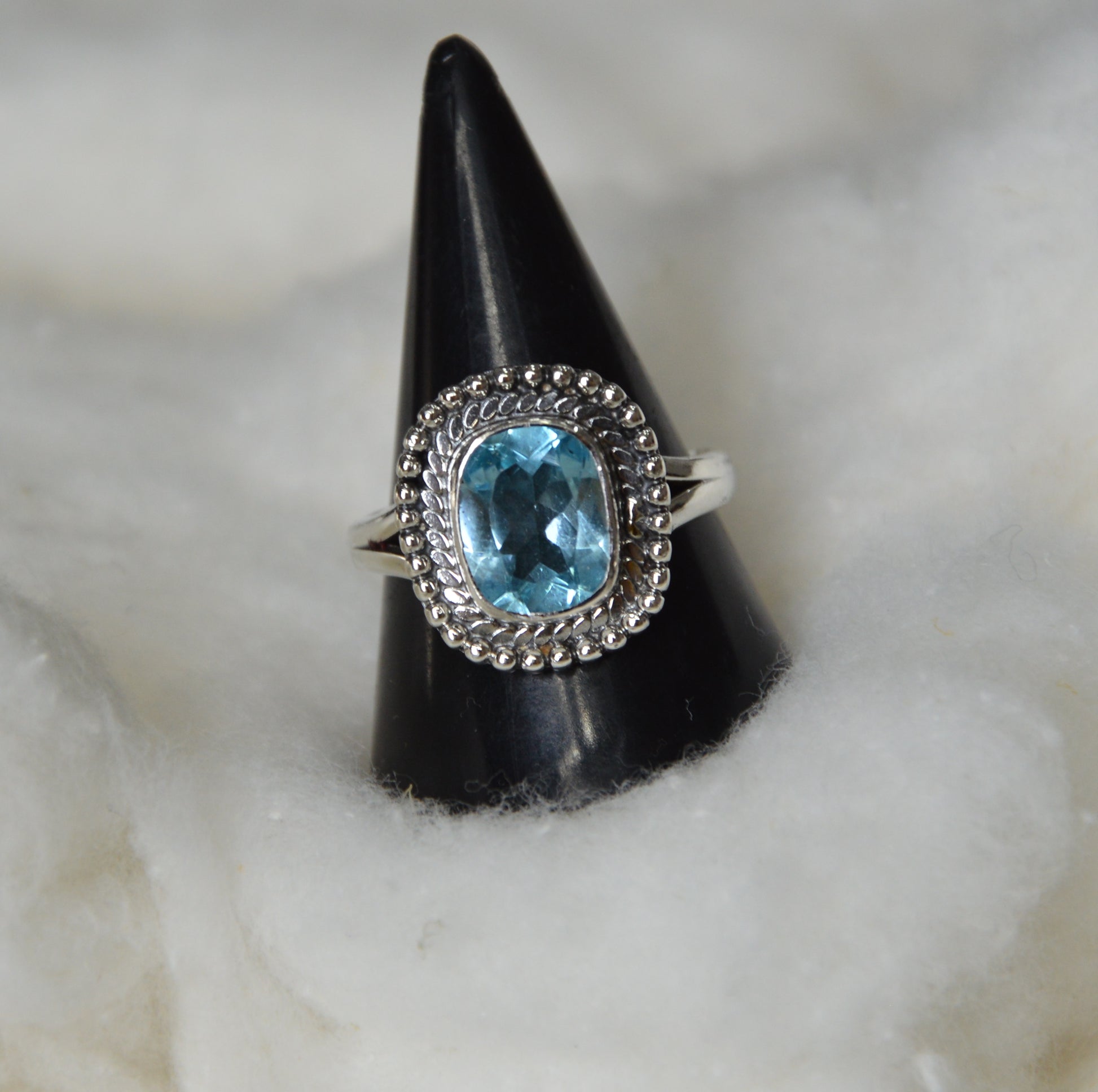 Perfect unisex gift — handmade blue topaz silver ring with vintage boho charm.
Unique silver ring for gifting, featuring real cushion-cut blue topaz and oxidized detail.
Statement gemstone ring made in India using 925 sterling silver and antique finish.
Minimalist silver ring with cushion-cut topaz — birthstone jewelry for December.
Spiritual healing crystal ring in oxidized silver with authentic blue topaz.
Blue topaz is the birthstone for December — wear it in a stylish oxidized ring.
Explore Jaipur’s art
