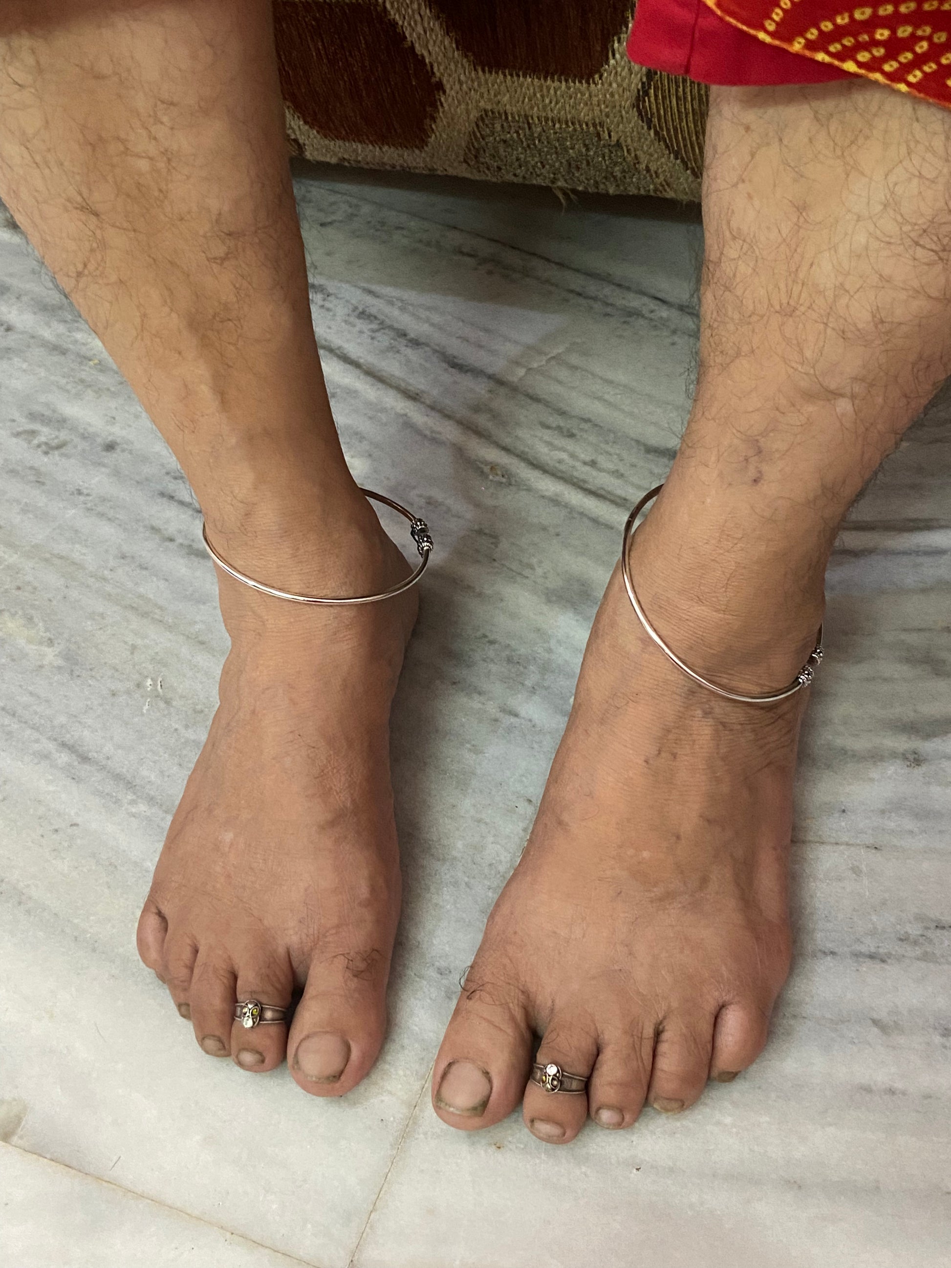 The tribal-inspired design enhances the beauty of traditional attire while also adding character to modern fashion choices. Its versatile styling possibilities make it an essential addition to any silver jewelry collection.

The handcrafted nature of this anklet ensures that every piece carries its own unique charm. Skilled artisans carefully shape and finish the silver to achieve a flawless appearance while preserving the authentic essence of tribal jewelry.