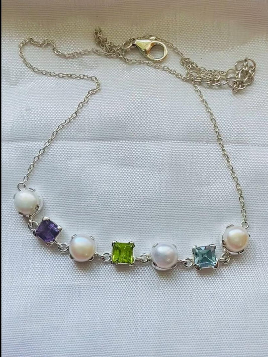 Sterling silver gemstone necklace, multistone silver necklace, amethyst peridot topaz necklace, freshwater pearl silver necklace, colorful gemstone necklace, dainty silver chain necklace, natural gemstone jewelry, pearl and gemstone necklace, handmade silver necklace, blue topaz necklace silver, square gemstone necklace, real gemstone necklace, amethyst necklace sterling silver, peridot necklace silver, birthstone necklace women, designer gemstone necklace, elegant silver necklace for women,  pearl necklace