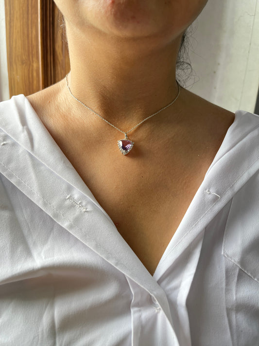 This 925 sterling silver pendant necklace is a beautifully crafted piece featuring a stunning natural amethyst gemstone in a distinctive triangle shape, surrounded by sparkling simulated diamonds. The design is elegant, timeless, and perfect for designers looking to create an exclusive collection of gemstone jewelry with high-quality craftsmanship. Whether you're a jewelry brand owner or a designer looking for a reliable jewelry manufacturing factory, 