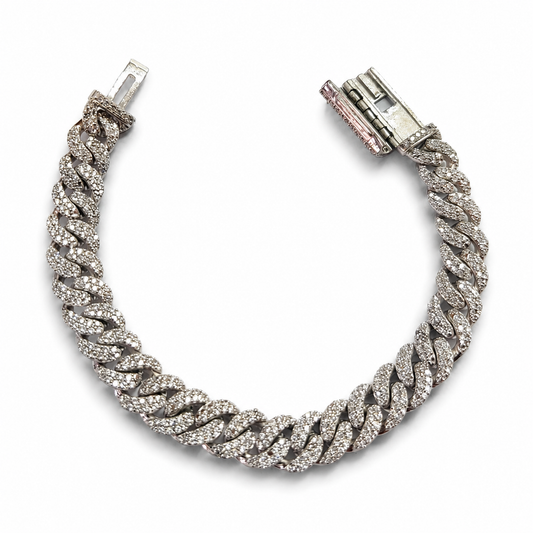 This silver mens bracelet in Cuban chain style is the perfect combination of luxury, fashion, and modern streetwear style for men. Crafted in 925 sterling silver with a premium silver plated finish, this Cuban chain bracelet for men gives a bold and stylish look that instantly upgrades any outfit. The chunky Cuban link bracelet design with sparkling American diamonds creates a luxury hip hop jewelry vibe loved by fashion-forward men and boys. This sterling silver bracelet for men is designed for those who l
