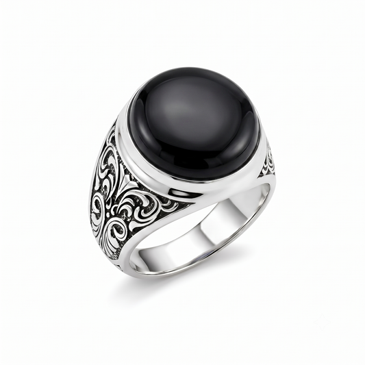 Bold men's rings are more than just accessories—they are a reflection of confidence, individuality, and timeless masculine style. This handcrafted Black Onyx Men's Ring is designed for those who appreciate powerful jewelry with a strong personality. Crafted from genuine 925 Sterling Silver, this statement ring combines premium craftsmanship with a rugged oxidized silver polish that enhances every intricate detail. The deep black color of the natural Black Onyx gemstone creates a striking contrast against th