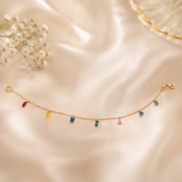 Colorful gemstone chain bracelet with elegant feminine appeal.
Sophisticated sterling silver jewelry handcrafted in India.
Modern bracelet design combining luxury and simplicity beautifully.
Fine silver chain bracelet with elegant hanging gemstone charms.
Adjustable bracelet for women with comfortable secure fit.
Handmade bracelet from Jaipur India with premium craftsmanship.
Luxury rainbow bracelet inspired by fine gemstone jewelry trends.