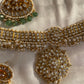  It is sustainable fashion at its finest, balancing ethical choices with spiritual and aesthetic beauty.

Each piece is made with love, patience, and traditional expertise in Jaipur—the heart of India's royal jewelry craftsmanship. This necklace takes 15 days to complete, a testament to the level of care and detail involved. The emerald and pearl bead knitting is done by hand, a delicate process that ensures uniqueness and individuality in every necklace. 