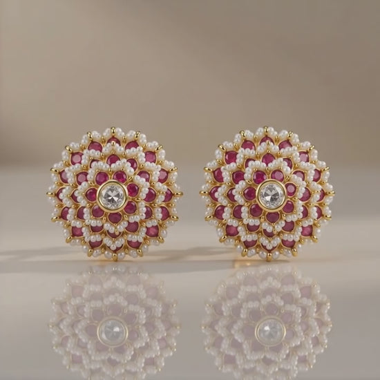 Discover the timeless elegance of handcrafted Polki jewelry created by expert artisans from Jaipur, India's renowned gemstone and jewelry manufacturing capital. This exquisite Polki Earrings Set with Pink Ruby and Pearl is crafted in genuine 925 Sterling Silver and finished with luxurious 22K Gold Plating, combining royal Indian heritage with modern sophistication. Every gemstone is carefully selected and meticulously set by skilled craftsmen using traditional techniques passed down through generations, ens