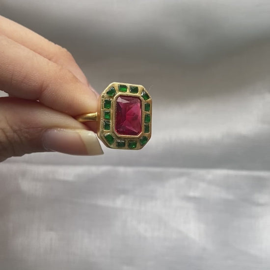 Whether you are buying this gold-plated silver ring for yourself or as a gift for a loved one, it holds not just emotional value but also financial worth. Over time, your investment in this sterling silver jewelry can appreciate, making it a meaningful addition to your collection.

The elegant design of this red and green kundan ring allows versatile styling. Pair it effortlessly with lehengas, bridal sarees, Anarkali suits, or even Indo-western outfits.
