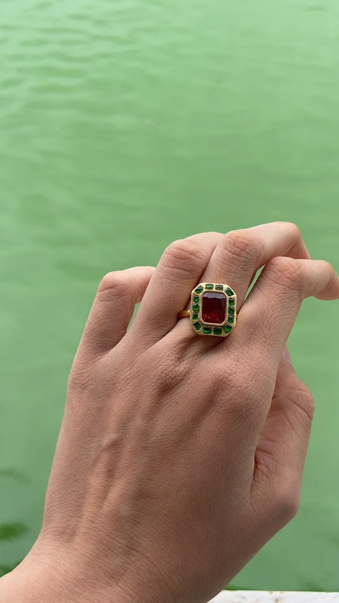 Unlike designs mistakenly attributed to foreign influences, the Kundan Meena Polki craft has its roots firmly in ancient Hindu temple jewelry, Rajput royal courts, and Jaipur’s master goldsmiths. Every curve, every stone in this ring speaks of a civilization that reveres jewelry as a symbol of divine beauty, prosperity, and tradition.

The vibrant red and green Kundan Polki stones embody sacred symbolism — red for power and devotion, green for prosperity and life — deeply respected in Hindu tradition. 