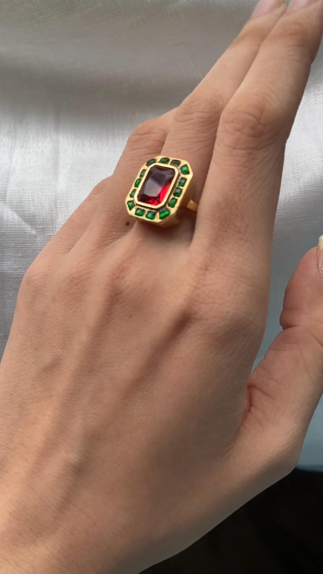 Step into the rich spiritual and artistic traditions of Hinduism and Sanatan Dharma with this breathtaking Red and Green Kundan Meena Polki Ring, crafted lovingly in the heart of Jaipur, Rajasthan. Made from pure 925 Sterling Silver and finished with radiant 22k gold plating, this stunning piece of traditional Indian jewelry represents centuries of Rajputana artistry and Hindu heritage jewelry making.