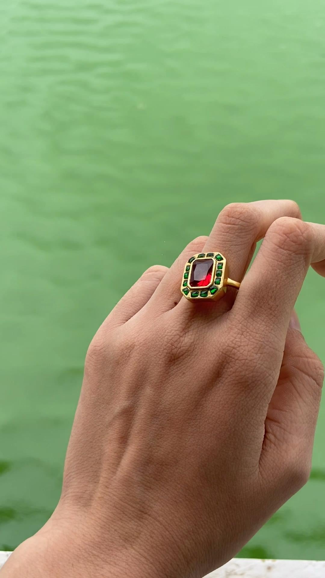 Add a regal charm to your jewelry collection with this beautifully handcrafted Red and Green Kundan Meena Polki Ring in 925 Sterling Silver. Finished with an opulent 22k gold plating, this piece captures the true essence of royal Indian heritage.