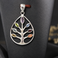Crafted from durable, hypoallergenic sterling silver, the openwork design features intricate bark texturing and a brilliant polish that illuminates the vibrant gemstones from every angle. Its perfectly balanced, unisex aesthetic ensures it looks equally striking on men and women, making it a versatile piece that effortlessly transitions from a casual daytime look to elegant evening wear.